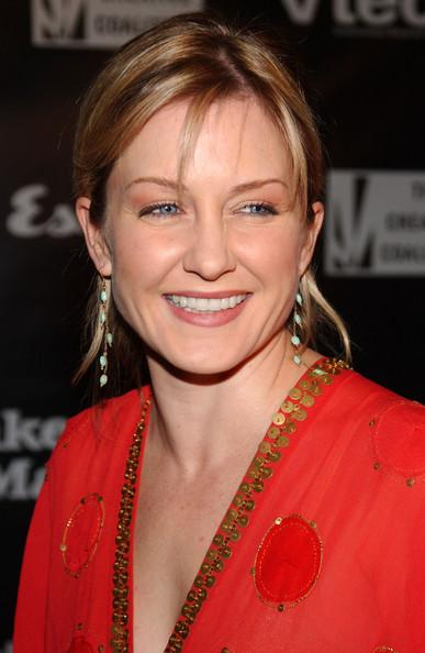 Amy Carlson smilingly